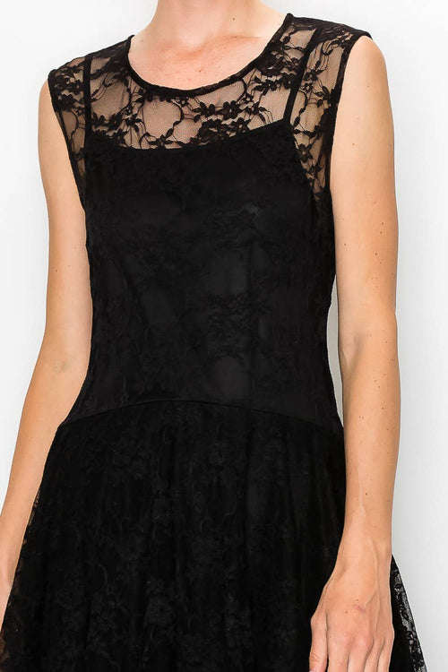 Elegant black lace and crochet dreess with bottom layers of organza for a flowy move. Free matching slip included. $69.99