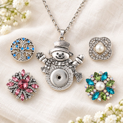 Sandy Snap Snowman with Crystals Interchangeable Charm Necklace plain base beside four separate decorative snaps; styling choices