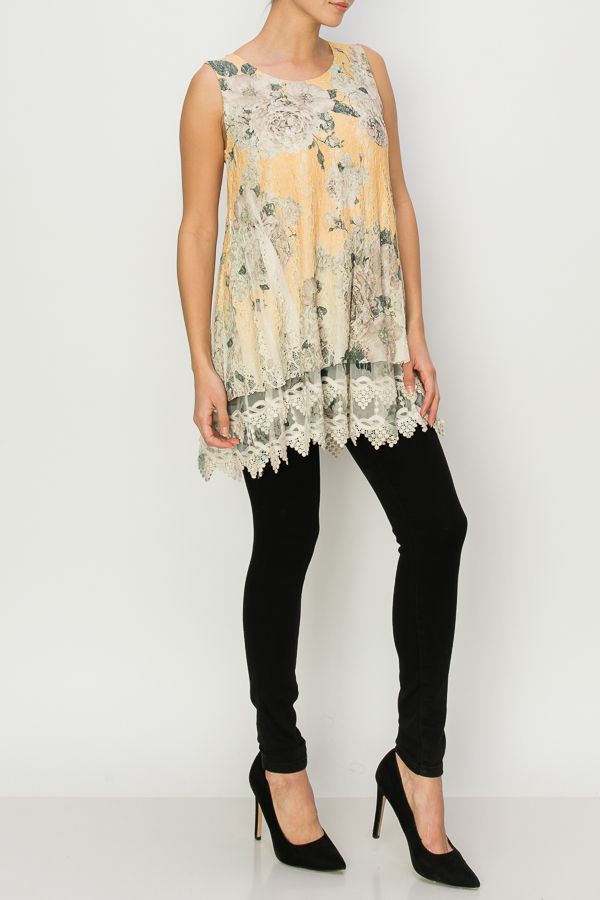 Beautiful Yellow floral top with elegant lace across the bottom hemline. 